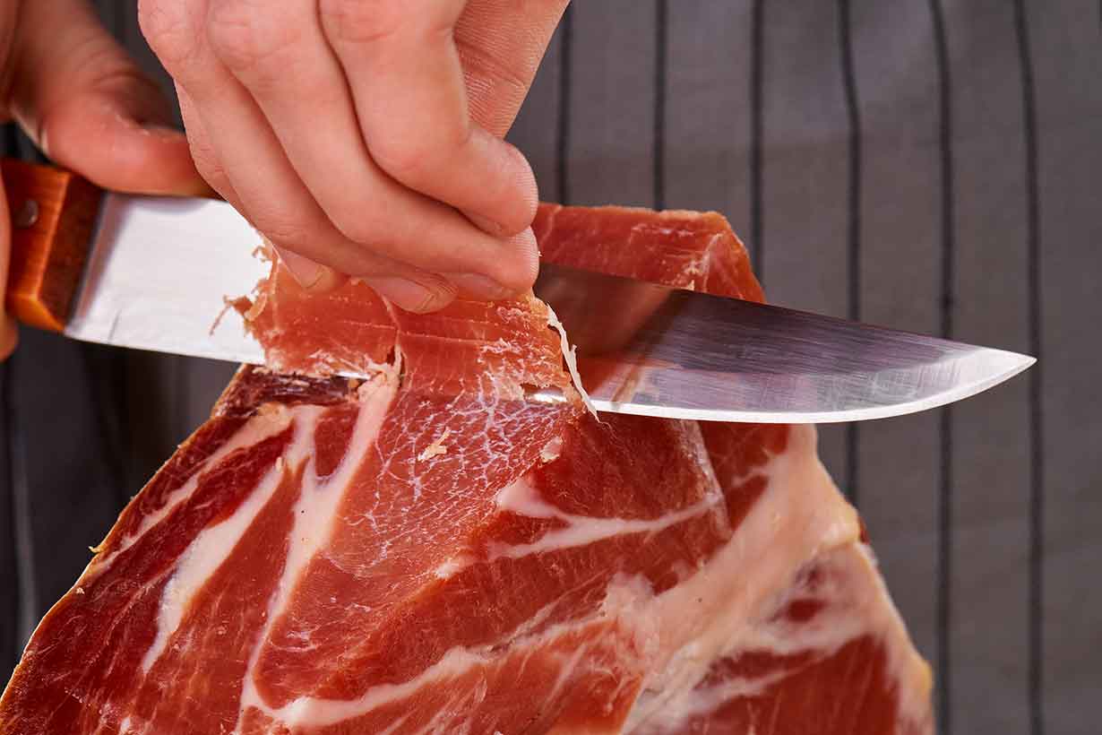 Slicing Jamön (Spanish Cured Ham) With a Sharp Knife.