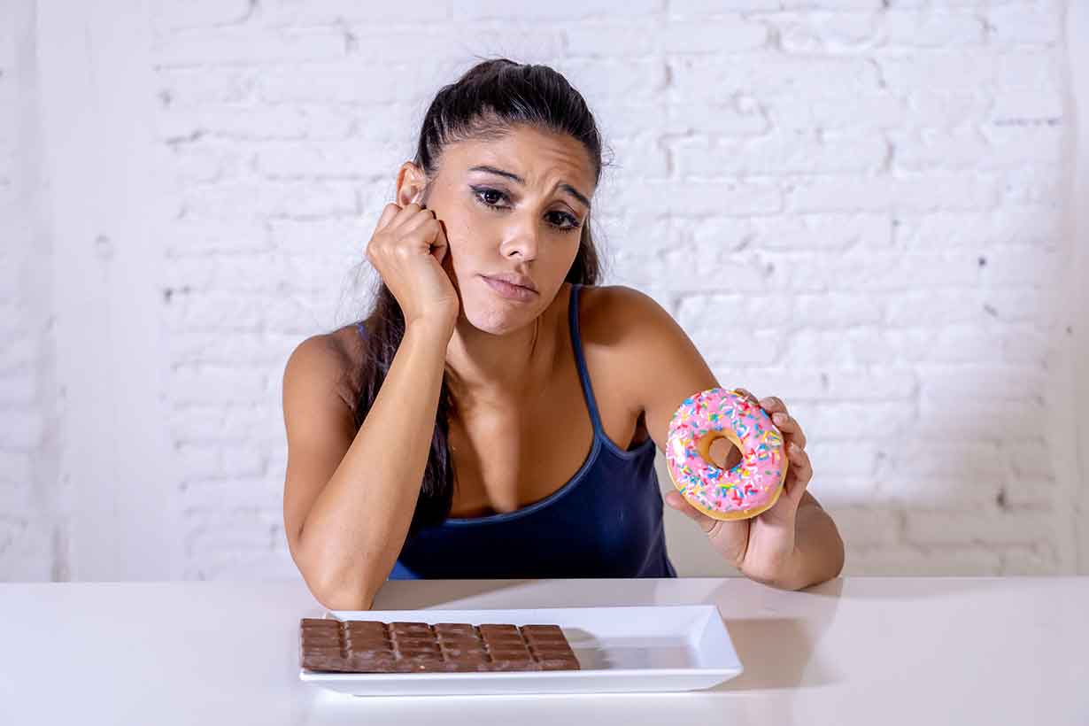 Young Lady Holding a Donut (Sugar Addiction Theme).