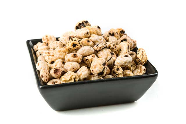 Pile of Tiger Nuts In Large Black Bowl.