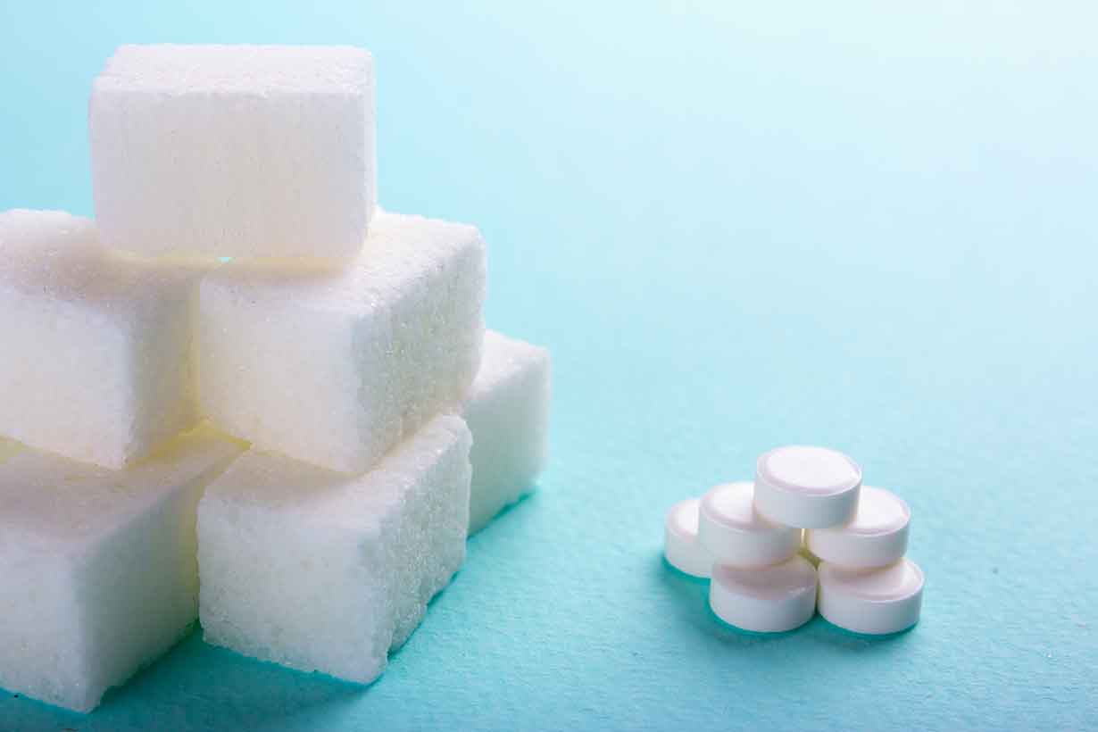 Various Sweeteners - Sugar Substitutes and Sugar Cubes.