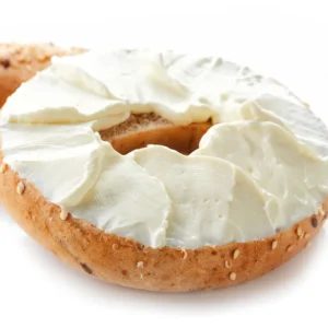 Cream cheese spread on a bagel.