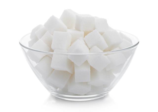 A Glass Bowl Full of Sugar Cubes.