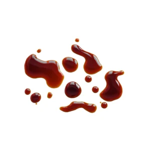 Spilt drops of Coconut Aminos sauce.
