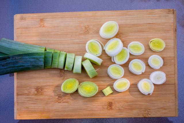 Sliced Leeks On a Wooden Chopping Board.