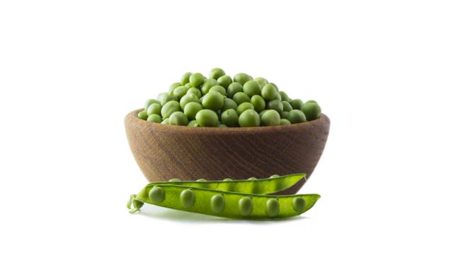 Green Peas In a Brown Bowl.