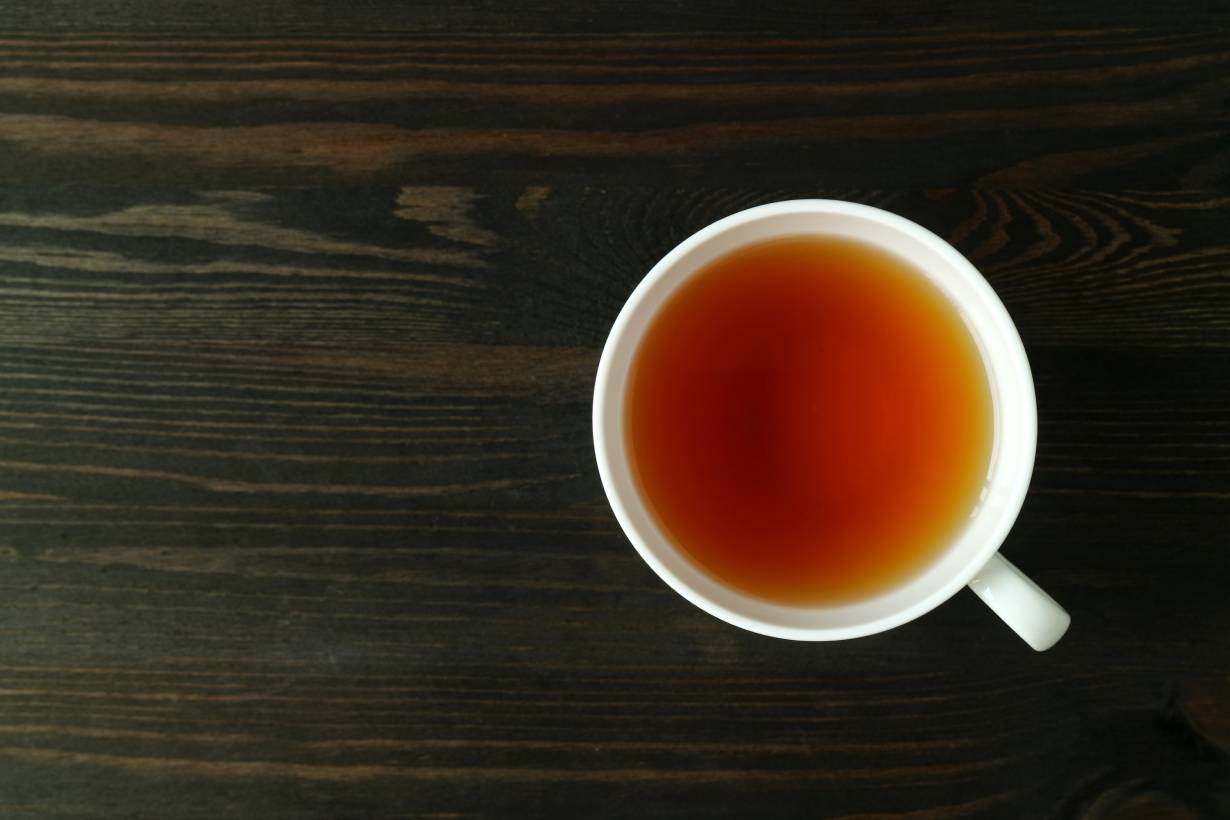 Cup of Barley Tea On a Wooden Surface.