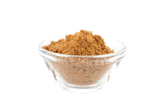 Garam Masala Powder In Clear Glass Bowl.