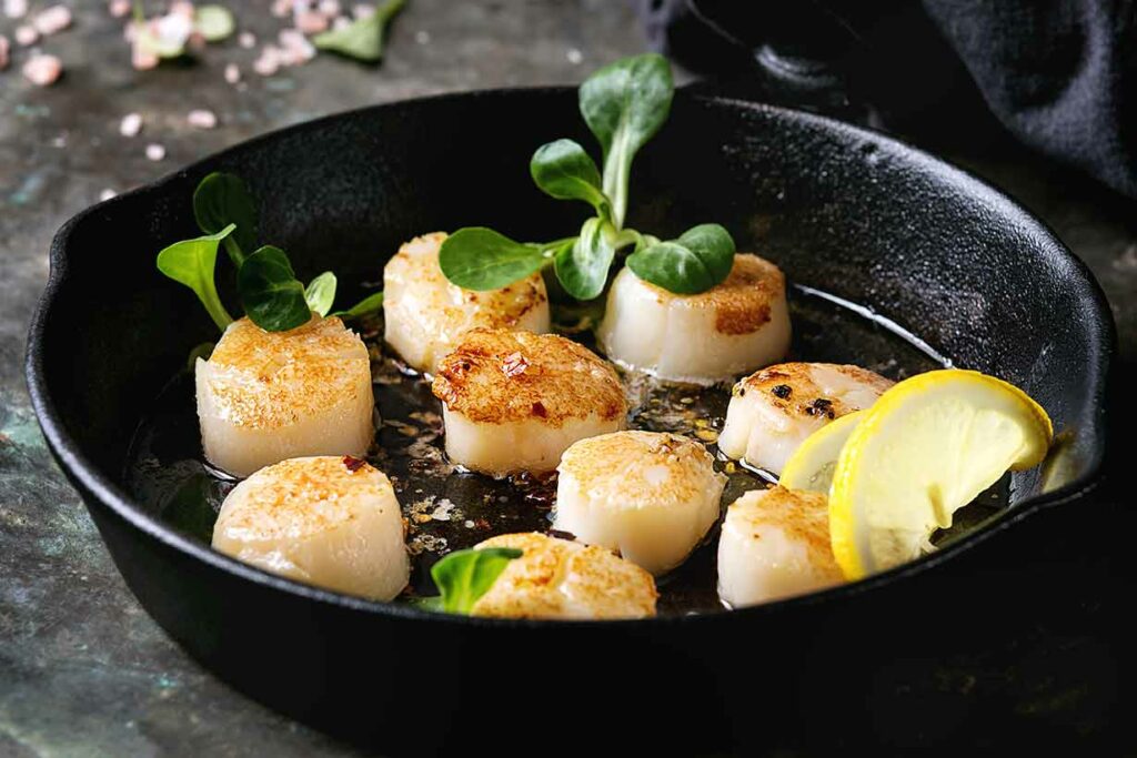 Browned Scallops In a Cast Iron Pan.