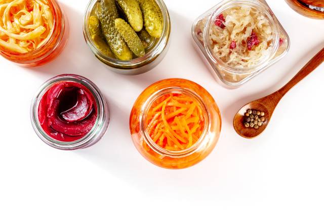 Various Fermented Foods In Glass Jars.