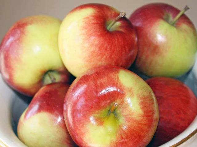 Several Green and Red Empire Apples.