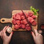 Diced Lean Meat On Chopping Board.