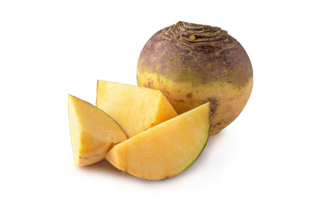 A Whole Rutabaga (Swede) and Pieces of Rutabaga.