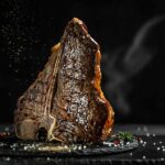 A T-Bone Steak Being Cooked.