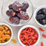 Different Dried Fruits In Small Bowls.