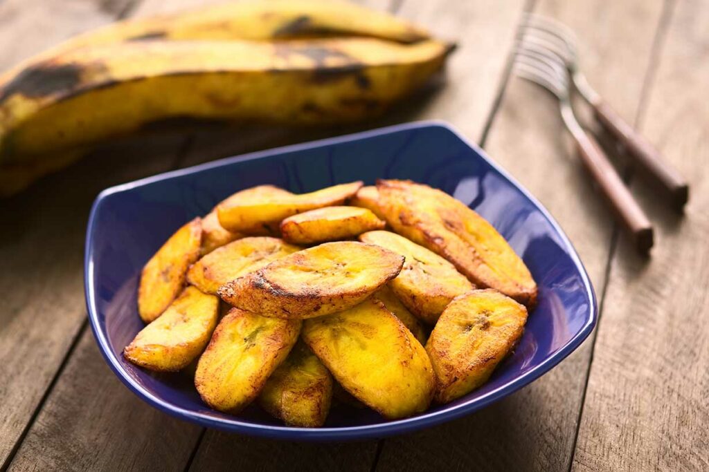 Fried Plantains In a Blue Bowl.