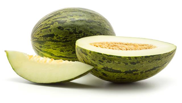 A Santa Claus Melon - Showing Skin and Flesh.