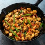 Quorn Mycoprotein Pieces In a Cast Iron Pan (Stir-Fry).