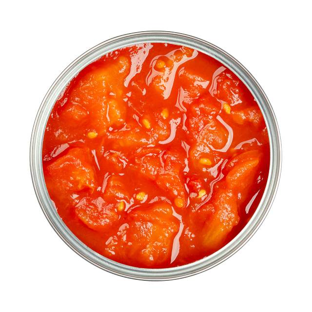 A close-up of an open can of chopped tomatoes.