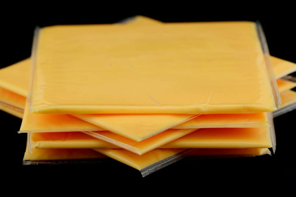 Individually wrapped American cheese (processed cheese) slices.