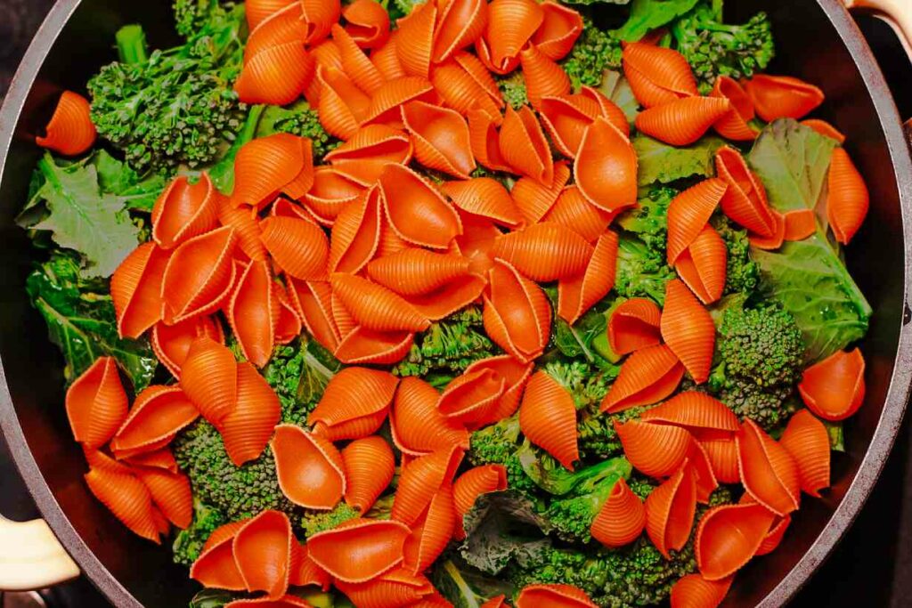 Red lentil pasta in a large pan.