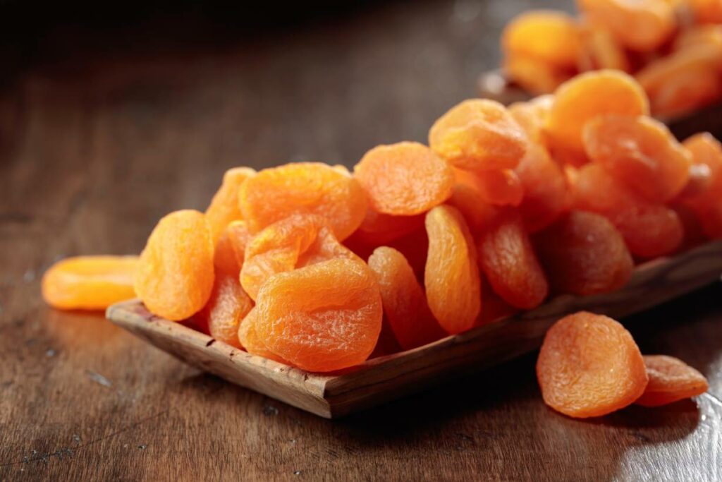 Dried Apricots On a Wooden Tray.