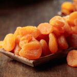 Dried Apricots On a Wooden Tray.