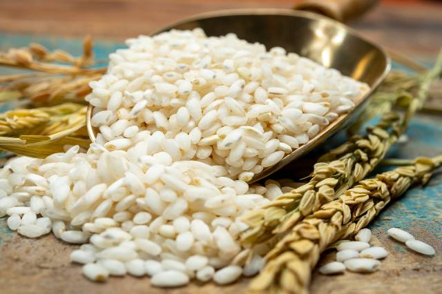 White Italian Arborio Rice In a Container.