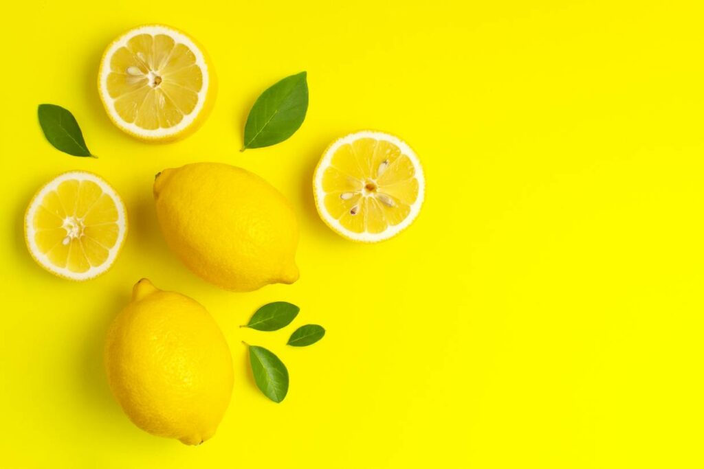 Yellow fruits theme showing lemon on a yellow background.