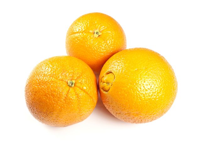 Three whole Cara Cara oranges.