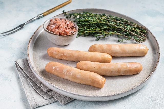 Turkey sausages on a plate.