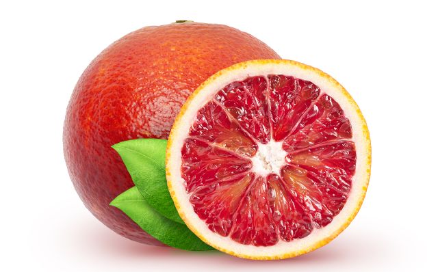 A Whole blood orange and half of one showing red flesh.