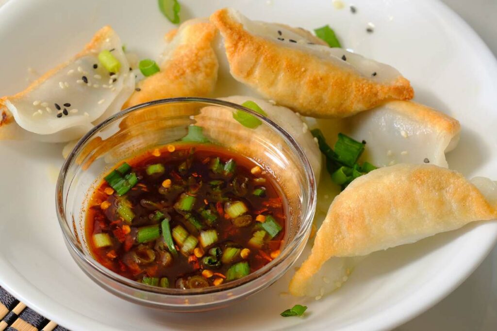 Ponzu sauce in a small glass bowl.