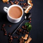 Mushroom coffee in a white cup.