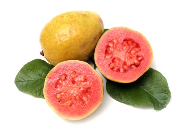 A whole guava and two halves.