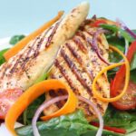 Grilled chicken breast with low-calorie vegetables.