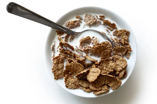 A bowl of Bran Flakes breakfast cereal.