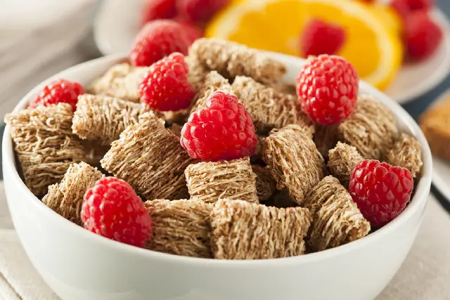 A bowl of Shredded Wheat breakfast cereal.