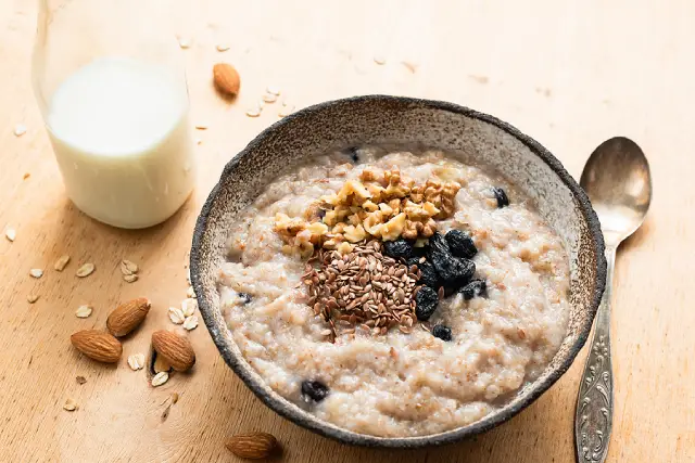 A bowl of oatmeal made with traditional rolled oats.