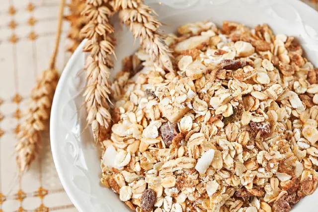 Swiss-style muesli in a white bowl.