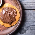 Nutella spread on pancakes.