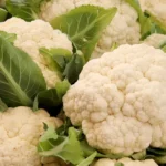 Cauliflower: Nutrition Profile and Potential Health Benefits Several whole cauliflowers grouped together.