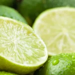Limes: Nutrition Facts and 5 Potential Health Benefits Whole limes and a lime sliced into two halves.